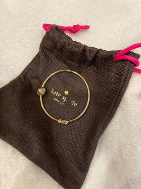 kate spade gold knot bangle with pouch
